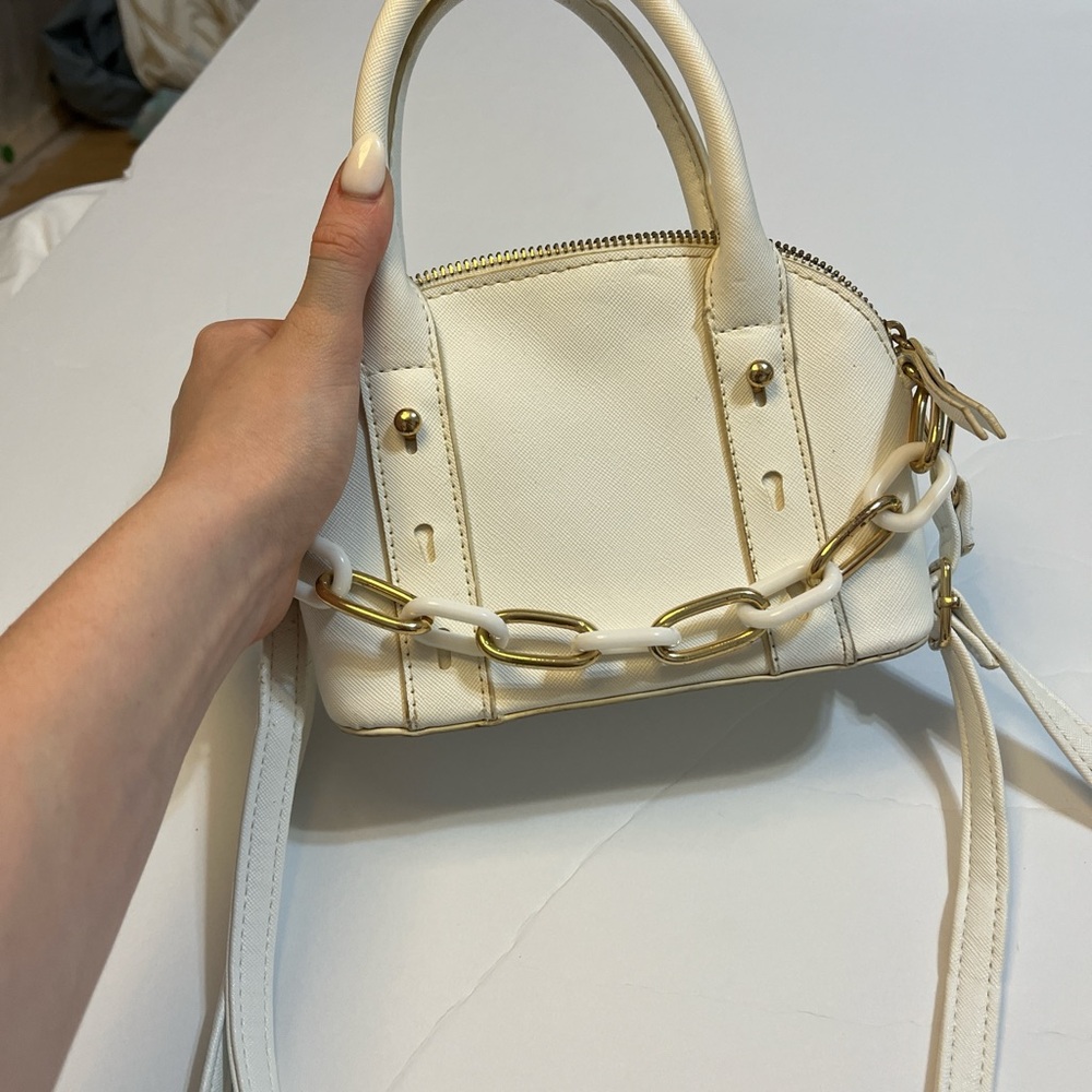 Elegant White Handbag with Gold Accents